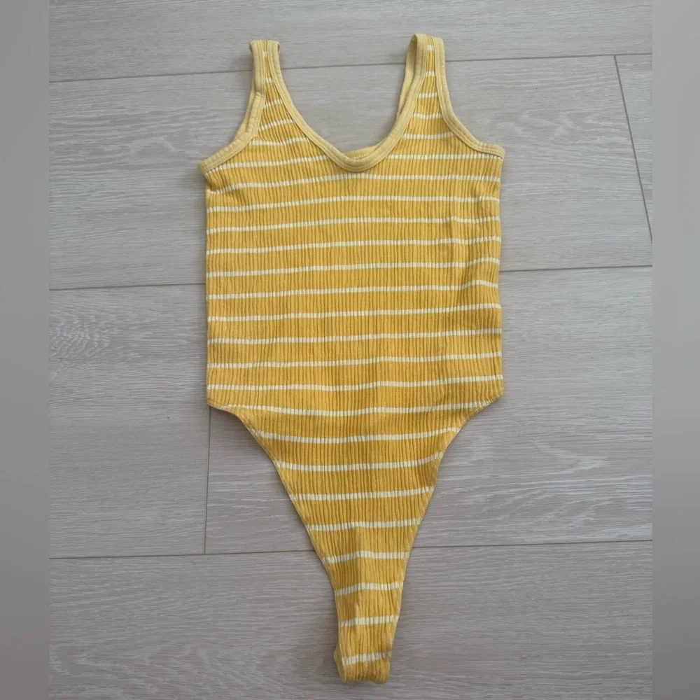 3/$10 Urban Outfitters Yellow and White Striped Bodysuit - Picture 3 of 11